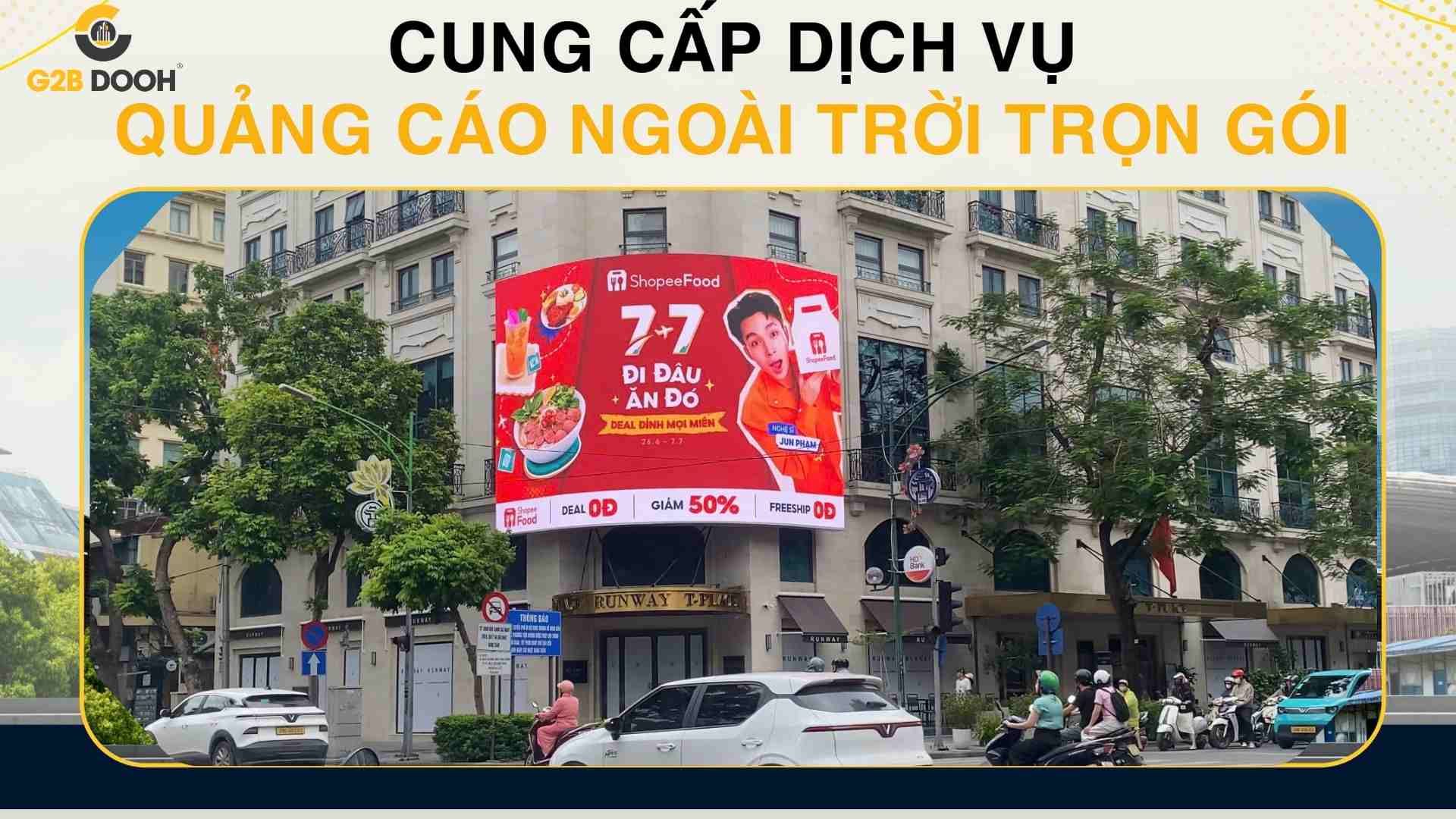 Quảng cáo ShopeeFood Jun Phạm 7.7 trên màn hình LED T Place ngã tư Tràng Tiền.